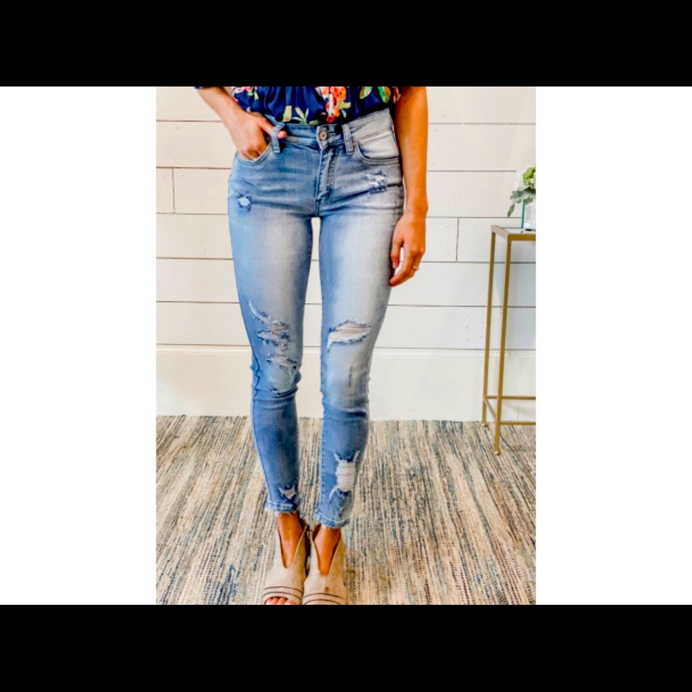 Distressed mid rise jeans